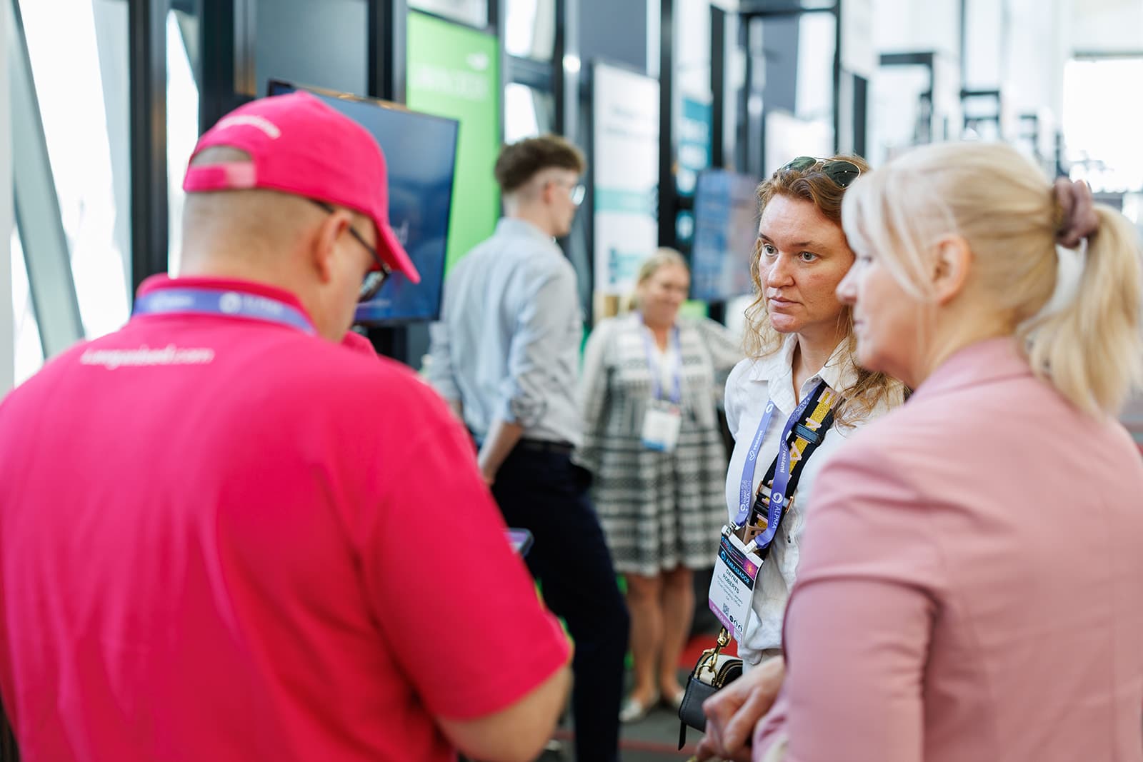 A Lawganised team member in conversation with delegates at the ALPMA Summit