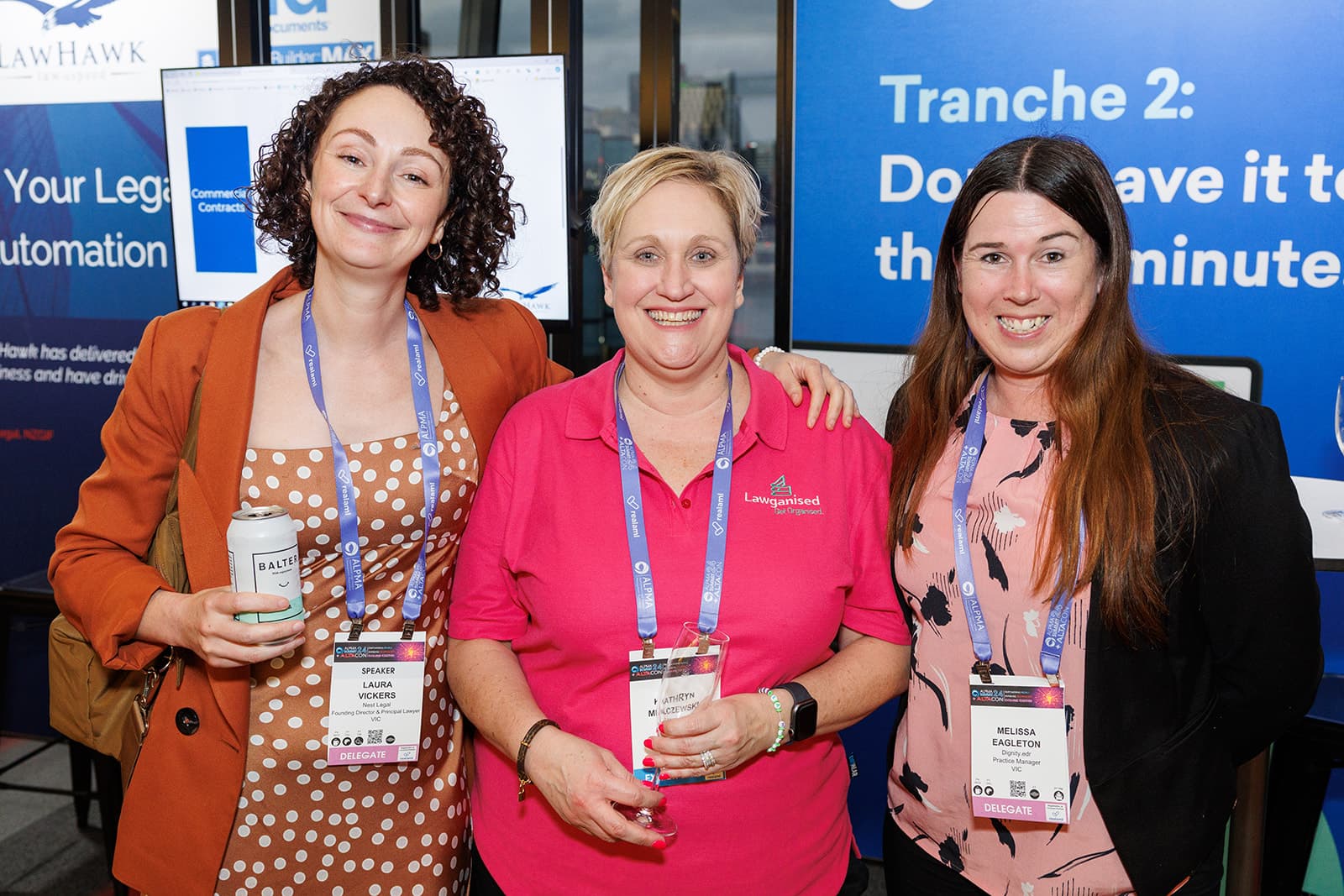 A Lawganised team member with two delegates at the ALPMA Summit