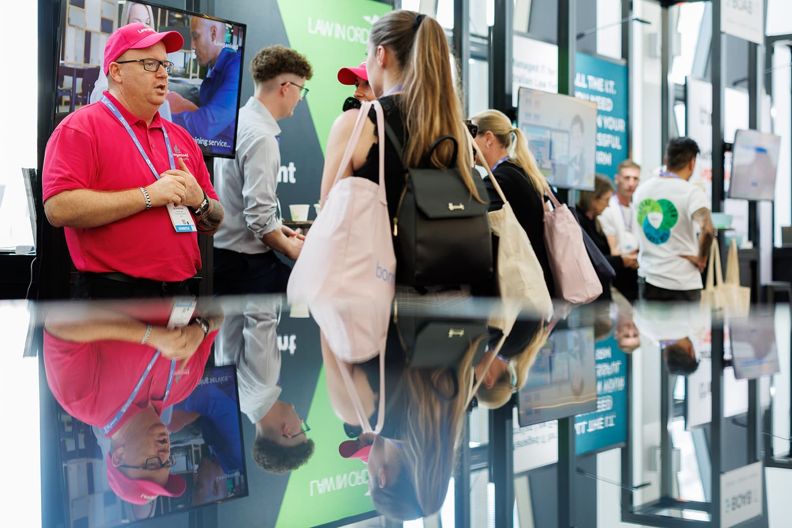 A Lawganised team member at the Lawganised stand on the ALPMA Summit exhibition floor